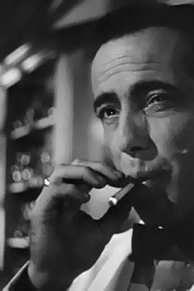Humphrey Bogart smokes his way through the 1942 classic <i>Casablanca</i>.