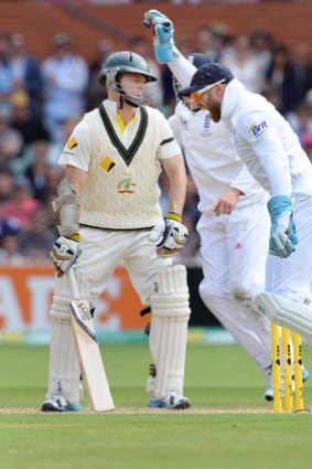 England wicketkeeper Matt Prior celebrates catching Chris Rogers.
