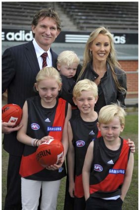 James Hird with wife Tania and kids after being appointed new coach of Essendon.
