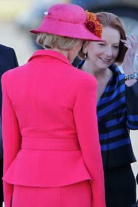 Royal greeting &#8230; the Queen with Julia Gillard, centre, and Quentin Bryce at Fairbairn RAAF base yesterday.