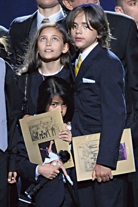 Paris, Prince and Blanket at their father's funeral.