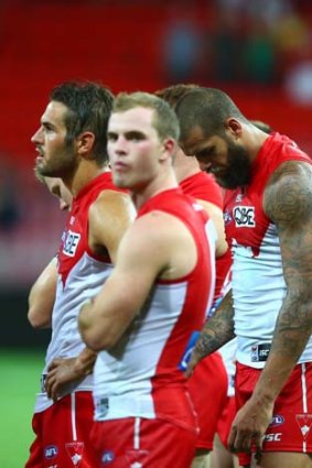 Lance Franklin and team mates look dejected after their round one match.