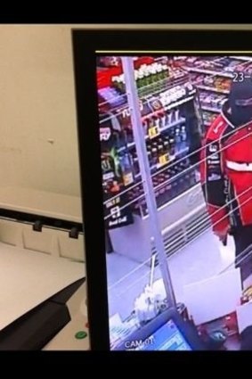 Police want to identify this man, who robbed a service station at Runaway Bay at gunpoint on the evening of August 23.