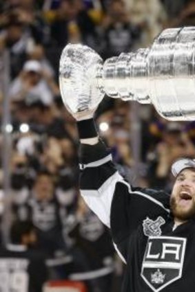 Marian Gaborik celebrates with the Stanley Cup