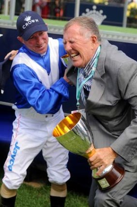 Horseplay ... Dear Demi's jockey and owner, Jimmy Cassidy and John Singleton, have some fun before posing for photos.