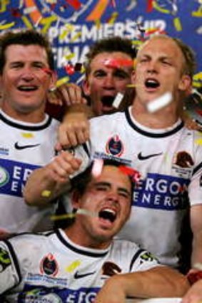 The Broncos celebrate their win over the Storm in 2006.