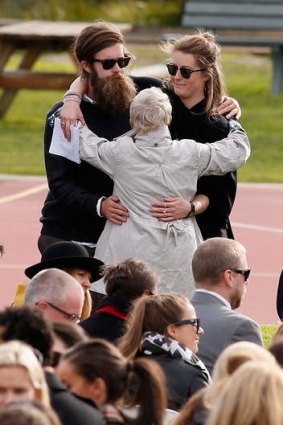 Mourners join Frankie and Liam Davison’s son and daughter, Sam and Milly at a memorial service in Mount Eliza.