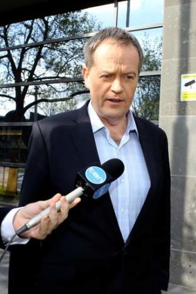 Labor's Bill Shorten leaves the ABC studios in Melbourne after Saturday's Labor loss in the Federal election.