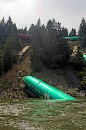 The train derailment damaged the shipment of jetliner fuselages and other large parts on its way to Boeing factories in Washington state.