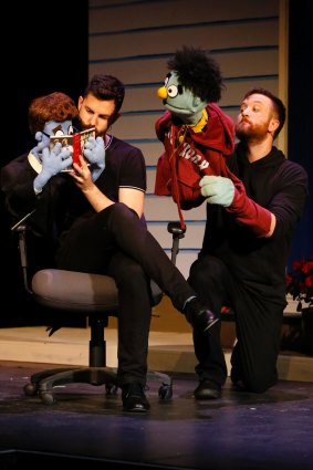 Joel Hutchings, left with Rod and Dave Smith, right, with Nicky in <i>Avenue Q</i>. Photo: Family Fotographics.?