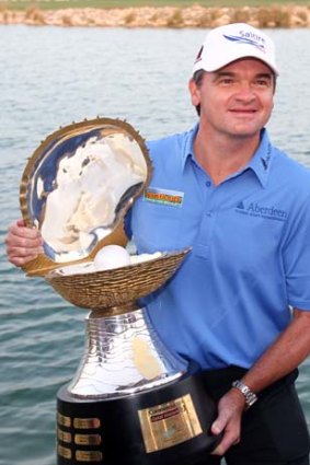 Paul Lawrie poses with the trophy.