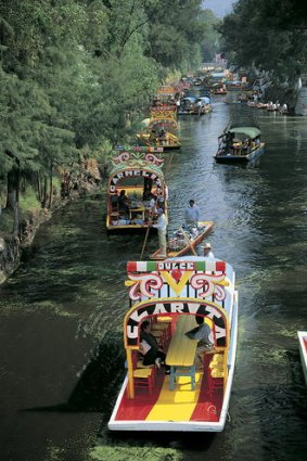 Xochimilco, take a boat ride down the river.