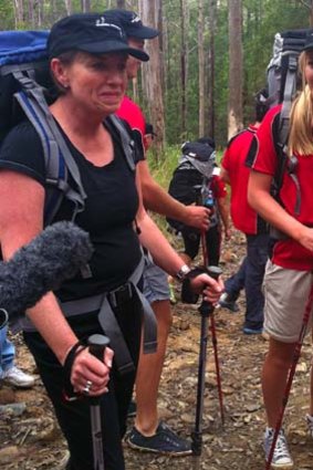 Anna Bligh starts the Sunday rounds in the Gold Coast hinterland with participants of the Kokoda Youth Challenge.