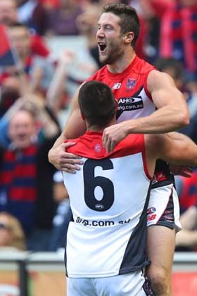 What a win ... James Frawley and Chris Dawes celebrate a goal.