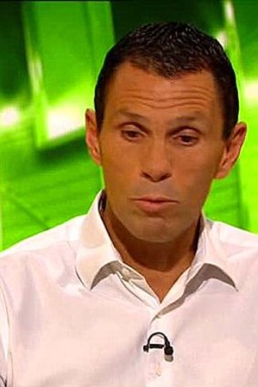 Gus Poyet reacts after being told by the BBC he has been sacked by Brighton.