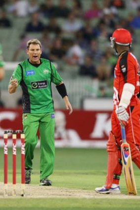 Heated exchange ... Shane Warne lets Marlon Samuels know what he's thinking.