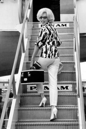 Marilyn Monroe boards a Pan Am flight Miami International Airport in 1962, the year she died.