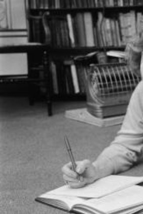 Scottish-born novelist Muriel Spark at work.