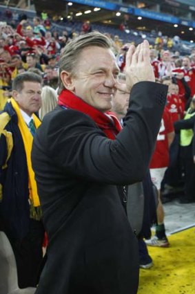 Jubilant: Daniel Craig celebrates his team's win.