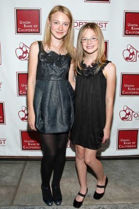 Dakota and Elle Fanning at an awards ceremony in 2008.
