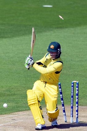 Australia's Phil Hughes is bowled.