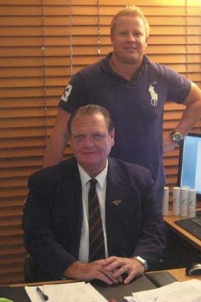 SensaSlim director Peter O'Brien, seated, with "managing director" Adam Adams.