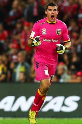Matthew Ryan, playing for the Mariners, celebrates during the A-League 2013 Grand Final against the Western Sydney Wanderers.