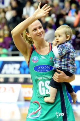 Sharelle McMahon with her son Xavier after the Vixens lost their preliminary final to the Firebirds.