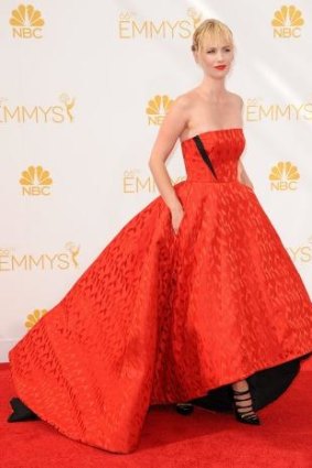 Actress January Jones, wearing a red Prabal Gurung dress, at the 2014 Emmys.