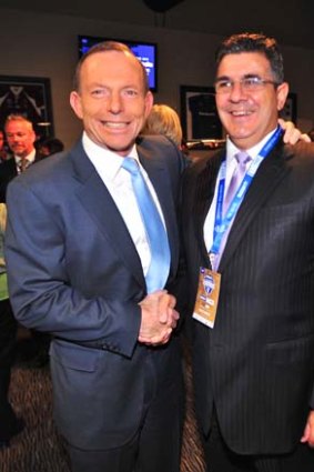 Tony Abbott and Andrew Demetriou.