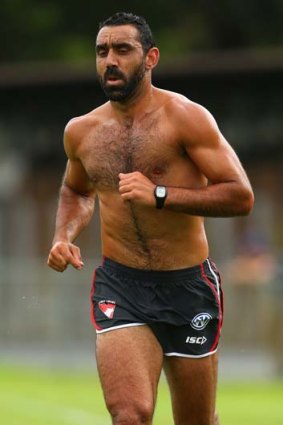 Adam Goodes warms up before an intra-club practice match on Friday.