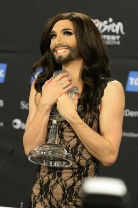 Last year's Eurovision winner, bearded drag queen Conchita Wurst, won the trophy while representing Austria .
