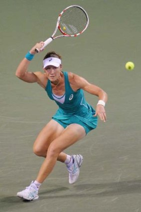 Samantha Stosur in action during her women's singles second-round match against Kimiko Date-Krumm.