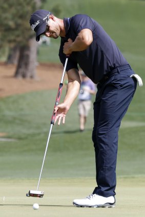 Anchor man: Adam Scott uses an anchored putter at the Augusta National Golf Club in 2015.