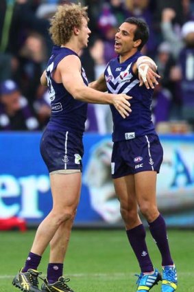 Chris Mayne and Danyle Pearce of the Dockers celebrate a goal during the qualifying final against Geelong.