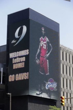 All is forgotten: A large electronic billboard in Cleveland welcomes back LeBron James after he announced he would return to the Cleveland Cavaliers after four years with the Miami Heat.