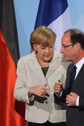 German Chancellor Angela Merkel said she won’t shy away from disagreeing with French President Francois Hollande.