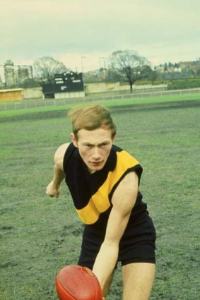An unfamiliar pose for Richmond's Kevin Barlett in the 1960s.