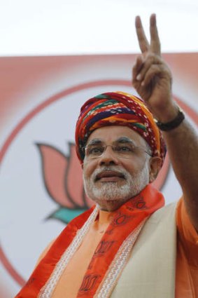Another victory &#8230; Chief Minister Narendra Modi greets supporters after winning a fourth term in elections.