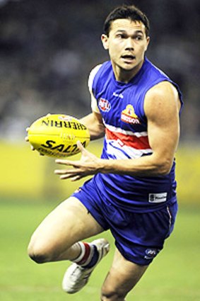 Skilful Western Bulldogs running backman Jarrod Harbrow will link up with the Gold Coast Suns in 2011.