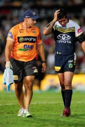 Headache: Queensland five-eighth Johnathan Thurston comes from the field last week.