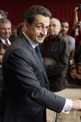 Nicolas Sarkozy has strongly supported the tough line of the German Chancellor, Angela Merkel, in imposing budget cuts and tax rises on troubled eurozone members.