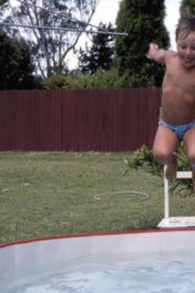Water world … A young Thorpe takes the plunge in his childhood backyard pool.
