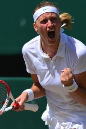 Petra Kvitova celebrates after winning the first set against Lucie Safarova.