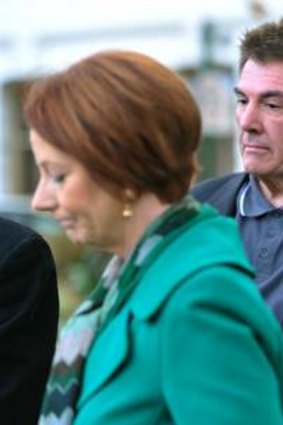 Prime Minister Julia Gillard (left) with Damien and Rae Panlock, parents of bullying victim Brodie.