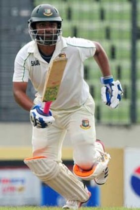Bangladesh opener Tamim Iqbal sets off for a run during his innings of 95.