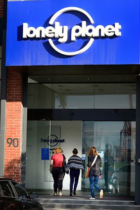 Staff arrive at Lonely Planet's Footscray office on Thursday morning to learn their fate.