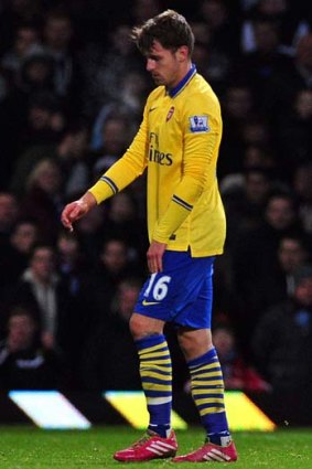 Aaron Ramsey leaves the pitch injured during the match between West Ham United and Arsenal on December 26.
