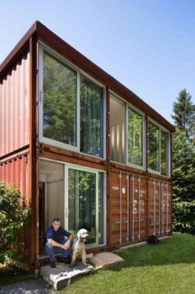 Architect Adam Kalkin with  a house he built out of shipping containers.