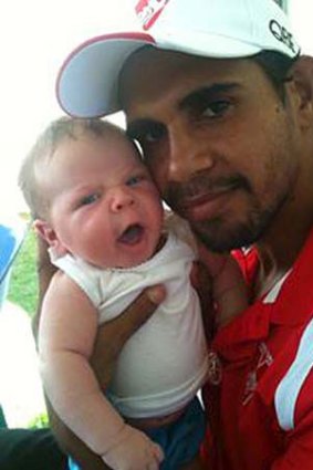 "He didn't cry when I first held him, but I had a few tears" ... Lewis Jetta, with son Lewis.